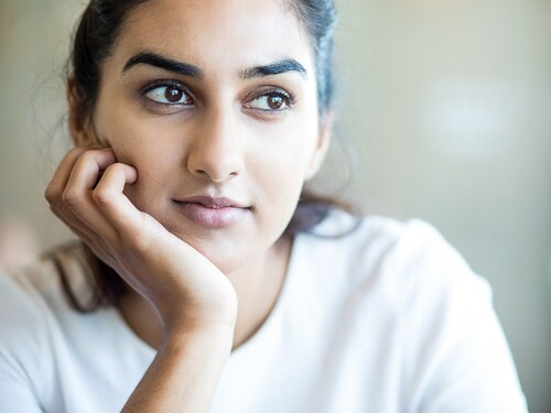 Dreamful Indian girl thinking of future