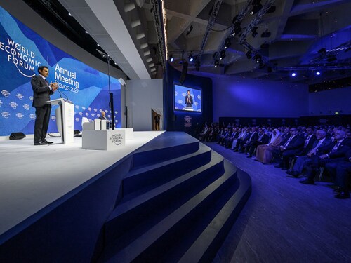 Emir of Qatar Sheikh Tamim bin Hamad al-Thani addresses the assembly during the World Economic Forum (WEF) annual meeting in Davos on May 23, 2022. (Photo by Fabrice COFFRINI / AFP)