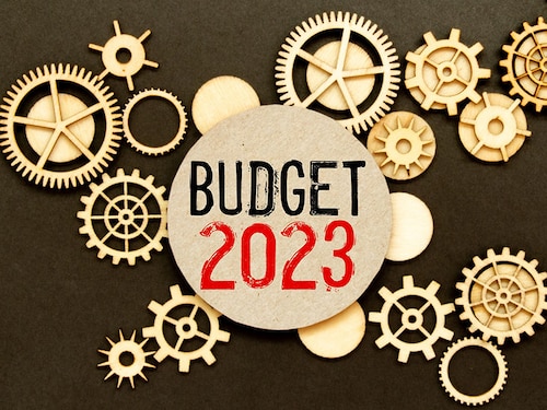 2023 Budget planning and allocation concept. Wooden cube the inscription BUDGET 2023 with green background, copy space. Use for banner and presentation