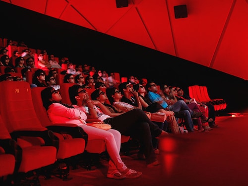 Cinema-goers wearing 3D glasses watch a movie at a PVR Multiplex in Mumbai November 10, 2013. Multiplex operators like PVR Ltd, Inox Leisure, Reliance Mediaworks and Mexican chain Cinepolis are scrambling to set up theatres targeting the rapidly growing number of middle-class Indians willing to pay to watch Bollywood movies in more comfortable surroundings. The potential is huge, provided operators can find the right location in a country where prime urban real estate is costly and in short supply. Picture taken November 10, 2013.       To match MULTIPLEX-INDIA/        REUTERS/Danish Siddiqui (INDIA - Tags: SOCIETY BUSINESS ENTERTAINMENT) - GM1E9BK0DGQ01