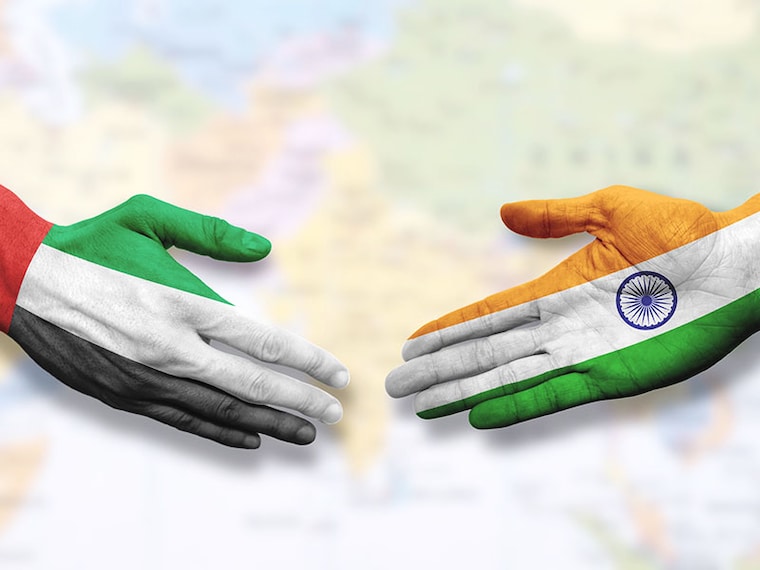 United Arab Emirates and India - Flag handshake symbolizing partnership and cooperation
