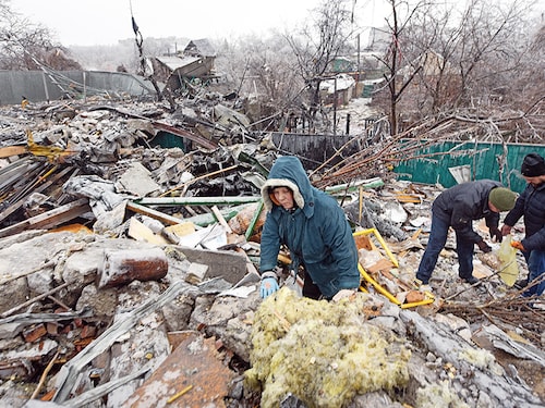 A picture taken on December 15, 2023 shows the aftermath of recent shelling in Yasynuvata (Yasinovataya), Russian-controlled Ukraine, amid the Russia-Ukraine conflict. (Photo by STRINGER / AFP)