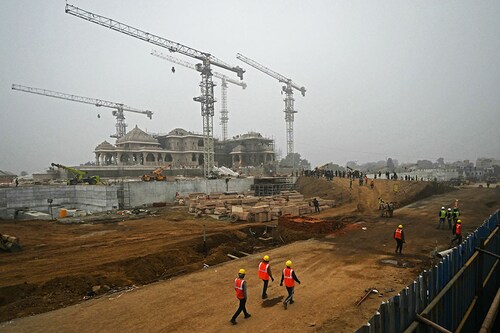 Workers are pictured at the construction site of a temple to Hindu deity Ram, in Ayodhya on December 29, 2023. Image: Arun Sankar/ AFP