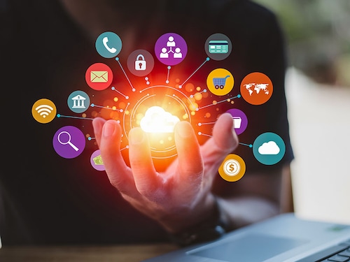 Cloud computing and technology icons touched by hand. Cloud technology collects lifestyle and confidential information such as shopping and internet banking, passwords, financial information.