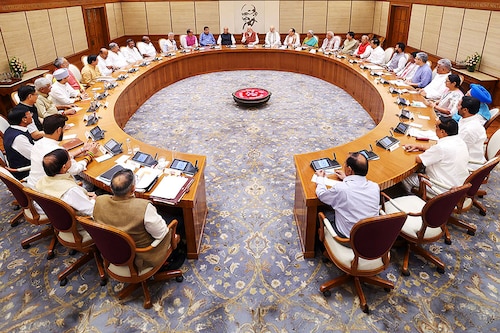 Prime Minister Narendra Modi unveiled his coalition government on June 10. The 71 members of his government took the oath of office after Modi on June 9, with 11 posts going to coalition allies who extracted them in exchange for their support, including five in the top 30 cabinet posts. Image: PIB/AFP
