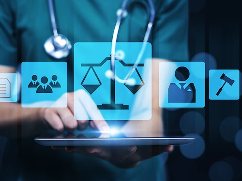 Medical healthcare pharmaceutical compliance law regulations and policies concept, female doctor holding tablet technology graphical showing law icon pharmacy healthcare contract rules human rights
