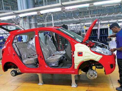 Nomura estimates the GST reduction could translate into a 5-10 percent increase in demand across various car segments. Image: Babu / REUTERS Nomura estimates the GST reduction could translate into a 5-10 percent increase in demand across various car segments. Image: Babu / REUTERS