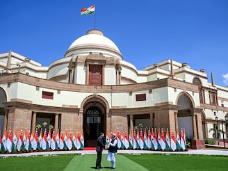 India's Prime Minister Narendra Modi (R) shakes hands with his Singaporean counterpart Lawrence Wong before their meeting at the Hyderabad House in New Delhi on September 4, 2025. The two leaders announced future partnerships and expanding co-operation in advanced manufacturing, green shipping, skilling, civil and urban water management through a joint statement; Photo by Sajjad HUSSAIN / AFP