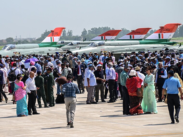 People gather to attend the farewell ceremony of India's MiG-21 fighter jets at the Chandigarh Air Force Station in Chandigarh on September 26, 2025. India's Russian-built MiG-21s flew for the final time on September 26, marking the end of an era for the country's first supersonic fighter jet — lauded for its valour but tarnished by a legacy of some 400 crashes. Image: AFP