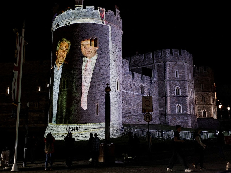 An image of U.S. President Donald Trump alongside disgraced financier Jeffrey Epstein is projected by the campaign group Led By Donkeys on Windsor castle, after the arrival of U.S. President Donald Trump and first lady Melania Trump for a state visit to the country, in Windsor, Berkshire, Britain September 16, 2025. Image: Phil Noble / Reuters