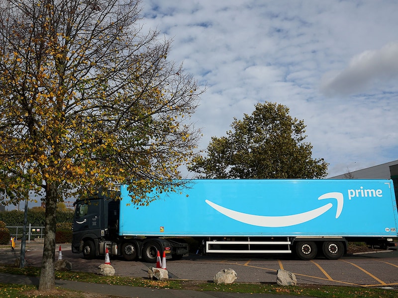An Amazon delivery truck is seen near a fulfilment centre in London, Britain. On Tuesday, Amazon Inc. announced plans to reduce its corporate workforce by up to 14,000 roles in the city, as part of a broader global restructuring targeting as many as 30,000 job cuts worldwide. The company will also lay off up to 1,000 employees in India, according to sources.