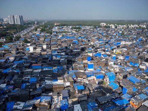 View of Mata Ramabai Ambedkar Nagar slums on October 14, 2025 in Mumbai, India. Maharashtra Chief Minister Devendra Fadnavis, along with Deputy Chief Ministers Eknath Shinde and Ajit Pawar conducted official ceremony (Bhoomipujan) for the redevelopment of Mata Ramabai Ambedkar Nagar and Kamaraj Nagar, marking the start of 4,345 new homes under Phase 1 of a major slum rehabilitation project in city.