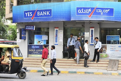 Yes Bank reported an 18.3 percent rise in net profit to Rs654.47 crore, while net interest income rose 4.6 percent year-on-year to Rs2,300 crore while net interest margin rose to 2.5 percent, 10 basis points up year-on-year.
Image: Manjunath Kiran / AFP Yes Bank reported an 18.3 percent rise in net profit to Rs654.47 crore, while net interest income rose 4.6 percent year-on-year to Rs2,300 crore while net interest margin rose to 2.5 percent, 10 basis points up year-on-year.
Image: Manjunath Kiran / AFP