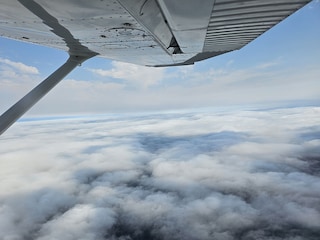 Cloud seeding involves spraying chemical salt particles within clouds from an aircraft's wings, to trigger rainfall to help wash pollutants out of the air.
Image : Shutterstock