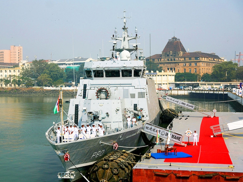 Indian Navy personnel stand on the INS Mahe, the first vessel in the Mahe-class series of Anti-Submarine Warfare Shallow Water Craft (ASW-SWC), during its commissioning ceremony at the Naval Dockyard in Mumbai, India, November 24, 2025.