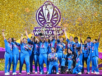 Indian women's cricket team celebrates their maiden win at ICC Women's Cricket World Cup 2025, beating South Africa by 52 runs in Navi Mumbai, India on Nov 3, 2025. Photo by Punit PARANJPE / AFP