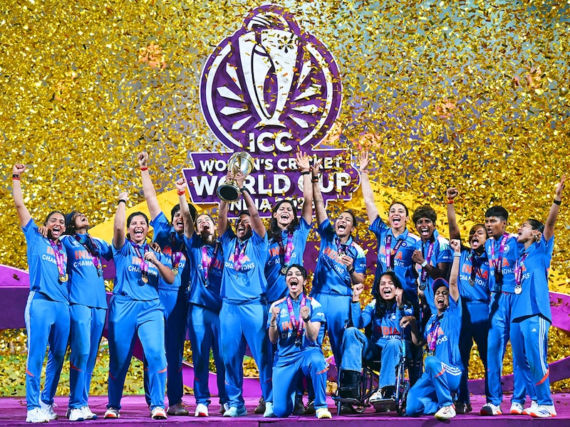 Indian women's cricket team celebrates their maiden win at ICC Women's Cricket World Cup 2025, beating South Africa by 52 runs in Navi Mumbai, India on Nov 3, 2025. Photo by Punit PARANJPE / AFP