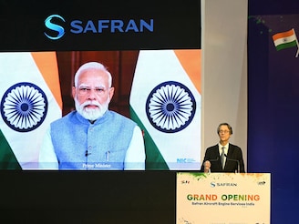 India's Prime Minister Narendra Modi joins in the video conference as Safran Aircraft Engine Services' Chief Executive Officer Olivier Andriès speaks during inauguration at GMR Aeropark in Hyderabad on November 26, 2025. India's Prime Minister Narendra Modi joins in the video conference as Safran Aircraft Engine Services' Chief Executive Officer Olivier Andriès speaks during inauguration at GMR Aeropark in Hyderabad on November 26, 2025.