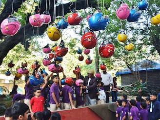 Helmet Man of India Raghavendra Kumar and his team organized helmet distribution to school students to create to create awareness about road safety and helmets among people from a young age at Thane collector office premises on November 20, 2025 in Thane, India. The initiative urged the assembled 100 students not only to wear helmets while cycling or riding pillion but also to encourage their parents and elders to use helmets while riding two-wheelers. Photo by Praful Gangurde/Hindustan Times via Getty Images