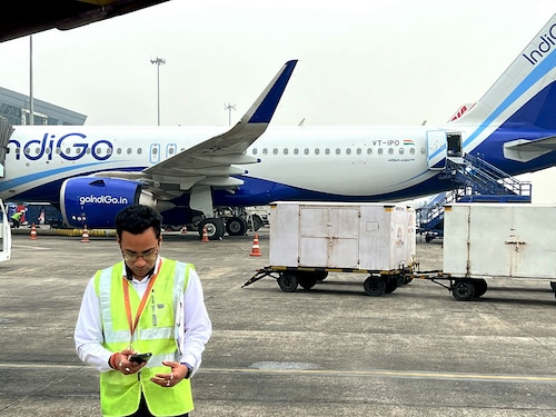 IndiGo, which controls more than 65 percent of the domestic aviation market, saw its network collapse under the revised Flight Duty Time Limitation (FDTL) rules that came into effect on November 1. Photo by Indranil Mukherjee / AFP IndiGo, which controls more than 65 percent of the domestic aviation market, saw its network collapse under the revised Flight Duty Time Limitation (FDTL) rules that came into effect on November 1. Photo by Indranil Mukherjee / AFP