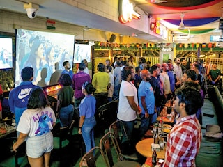 Cricket fans watching a match at a Bengaluru pub during the 2024 T20 World Cup
Photo by: Idrees Mohammed/AFP Via Getty Images