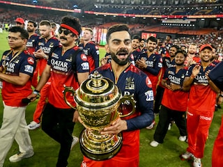 Virat Kohli (centre) takes the victory lap with his teammates after RCB won its first IPL title at the Narendra Modi Stadium in Ahmedabad on June 4
Photo by Arun Sankar / AFP 
