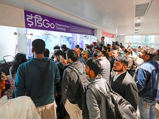 Passengers crowd the IndiGo airlines counter at Indira Gandhi International Airport Terminal 1 after delays and cancellations of multiple flights on December 4, 2025 in New Delhi, India.  
Photo by Sanjeev Verma/HT via Getty Images
