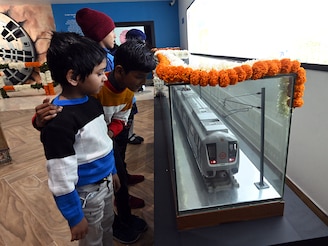 NEW DELHI, INDIA - DECEMBER 17: Visitors seen taking the tour of newly inaugurated Delhi Metro Museum at Supreme Court Metro Station on December 17, 2025 in New Delhi, India. (Photo by Sonu Mehta/Hindustan Times via Getty Images)