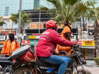: Gig workers with Zomato and Swiggy waiting for their food delivery orders at City Centre Mall in sector 12, Dwarka, New Delhi. 31st December, 2025
Photo by : Amit Verma
