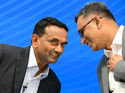A file photo of Tata Consultancy Services' CEO K. Krithivasan (left) and CFO Samir Seksaria. Photo by Indranil Mukherjee / AFP