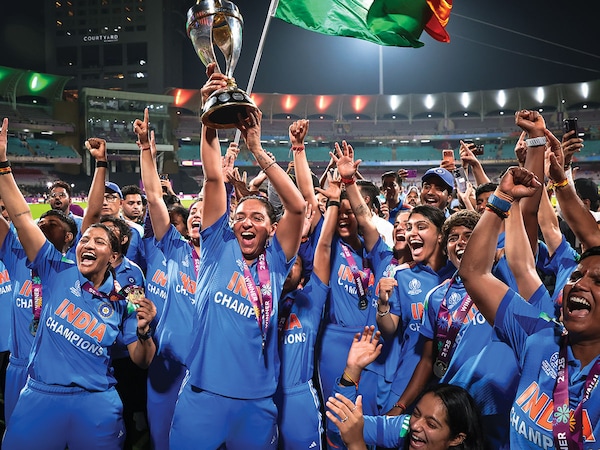 Harmanpreet Kaur holds up the World Cup trophy after her team’s victory in the ICC Women’s Cricket World Cup India 2025 Final match between India and South Africa at Dr DY Patil Sports Academy on November 2 in Navi Mumbai;
Photo by Nikhil Patil/Getty Images
