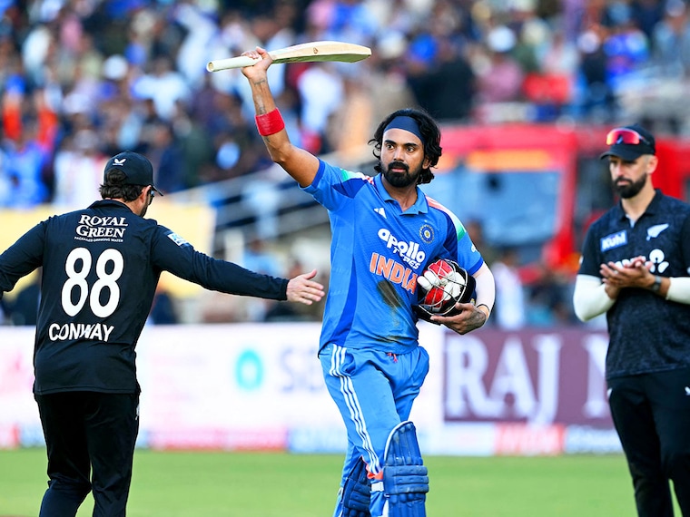 India's KL Rahul (C) celebrates after scoring a century (100 runs) during the second one-day international (ODI) cricket match between India and New Zealand at Niranjan Shah Stadium in Rajkot on January 14, 2026. Photo by Punit Paranjpe / AFP