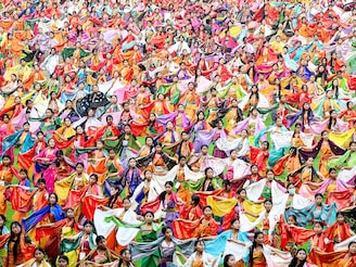 Dancers perform the 'Bagurumba' dance during a rehearsal for the upcoming Bwisagu festival, marking the Bodo New Year, at the Sarusajai Stadium in Guwahati on January 15, 2026. Photo by Biju BORO / AFP