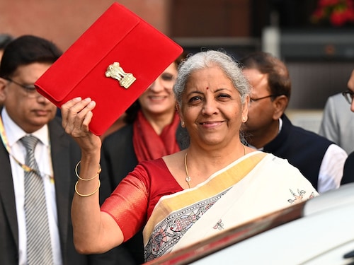 File) Union Finance Minister Nirmala Sitharaman holds up a folder outside the Finance Ministry ahead of the presentation of the 'Union Budget 2025-26', on February 1, 2025 in New Delhi, India. Photo by Salman Ali/Hindustan Times via Getty Images