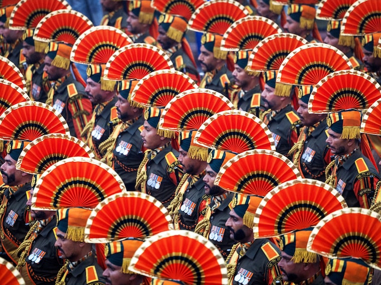 Even as it rains off-season in New Delhi, Indian soldiers march on, practicing for the annual Republic Day parade.