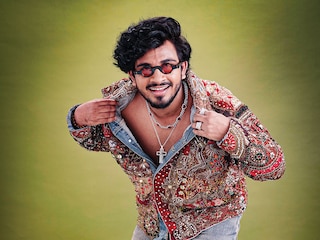 Sanju Rathod, Musician. Photo by Harsh Jimnani. Styling: Kairavi Jhaveri; Embellished jacket: The Banjara Trail