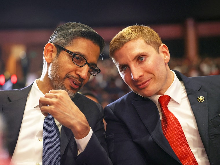 Google and Alphabet CEO Sundar Pichai and U.S. Under Secretary of State for Economic Affairs, Jacob Helberg attend a session at the AI Impact Summit, in New Delhi, India, February 20, 2026. Photo by Reuters/Bhawika Chhabra