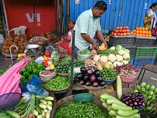 The 9.1 percentage point reduction in food’s share reflects rising incomes and diversifying consumption habits across Indian households.
Photo by Indranil Mukherjee / AFP