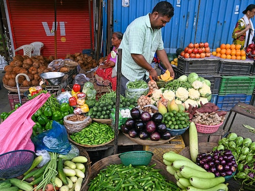The 9.1 percentage point reduction in food’s share reflects rising incomes and diversifying consumption habits across Indian households.
Photo by Indranil Mukherjee / AFP The 9.1 percentage point reduction in food’s share reflects rising incomes and diversifying consumption habits across Indian households.
Photo by Indranil Mukherjee / AFP