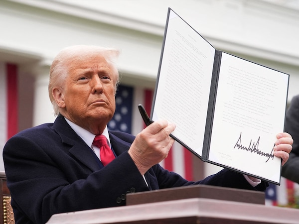 A file photo of U.S. President Donald Trump displaying a signed executive order imposing tariffs on imported goods during a 'Make America Wealthy Again' trade announcement event at the White House, US. 
Photo by Andrew Harnik / Getty Images via AFP
