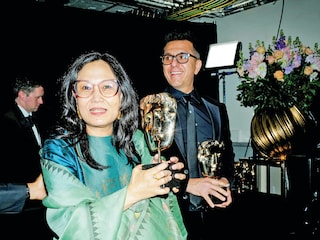 :  Lakshmipriya Devi and Ritesh Sidhwani backstage during the EE BAFTA Film Awards 2026 at The Royal Festival Hall on February 22, 2026 in London, England.  Photo by Carlo Paloni/BAFTA via Getty Images