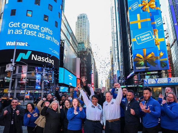 (File) Walmart and Sam's Club executives and field associates celebrate the ringing of the opening bell outside of the Nasdaq Marketsite on December 09, 2025 in New York City, as the company began trading on Nasdaq after moving its common stock listing from the New York Stock Exchange (NYSE) where it has been for 53 years. Photo by Michael M. Santiago / GETTY IMAGES NORTH AMERICA / Getty Images via AFP