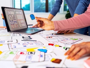  Shapes, colours and spatial elements subtly influence emotion and decision-making; whether it’s a red “sale” sticker or a rounded logo, these cues instantly direct attention and shape responses. Photo by Shutterstock

