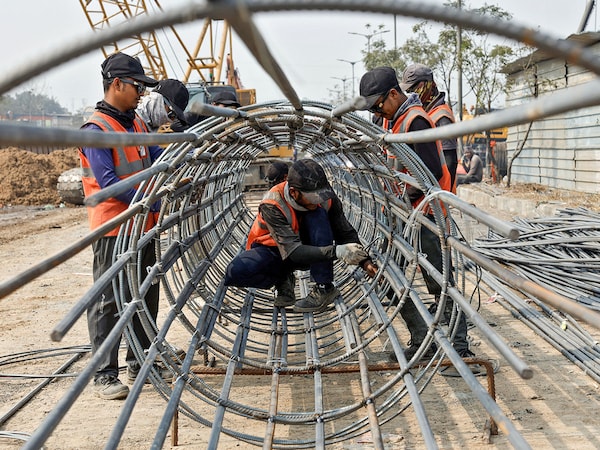 While youth from land-owning families can often afford to wait for “suitable” aspirational jobs, those from landless or marginalised backgrounds are frequently forced into immediate, informal labour like painting or construction to support their families.. Photo by Amit Dave / Reuters