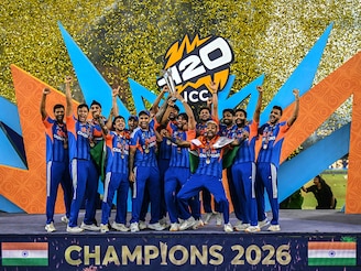 India's players celebrate with the trophy after winning the 2026 ICC Men's T20 Cricket World Cup final match against New Zealand at the Narendra Modi Stadium in Ahmedabad on March 8, 2026. India's players celebrate with the trophy after winning the 2026 ICC Men's T20 Cricket World Cup final match against New Zealand at the Narendra Modi Stadium in Ahmedabad on March 8, 2026.