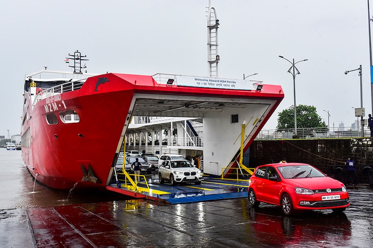 People and cars coming out of the M2M ferry, on August 20, 2020 in Mumbai, India. The Ro Ro service which was started in March have resumed services between Mumbai and Alibaug after 5 months of Lockdown.