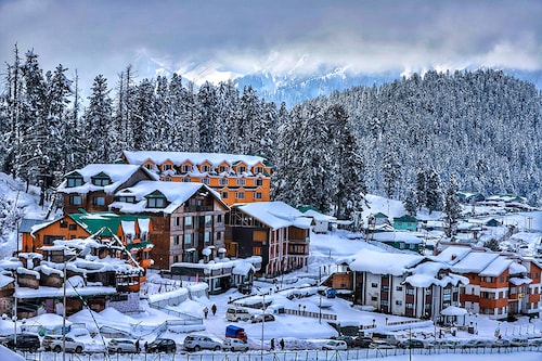 View of hotels amid snow in Gulmarg, Baramulla Jammu and Kashmir, India on 13 December 2020. The Associated Chamber of Commerce and Industries-Kashmir (CCIK) has expressed its anguish over the non-extension of lease of hotels in Gulmarg. The chamber in a statement said, the members of the Associated Chamber of Commerce and Industries-Kashmir (CCIK) and business community of Kashmir particularly the tourism players are in deep shock over the aggressive and coercive measures taken by authorities against hotels in Gulmarg who have been existing there from more than 40 years. As informed, though all the formalities for extension of lease have been completed by the lessees in time, their lease has not been extended for reasons best known to the powers that be. It may not be improper to say that they are being penalised for no fault of theirs.