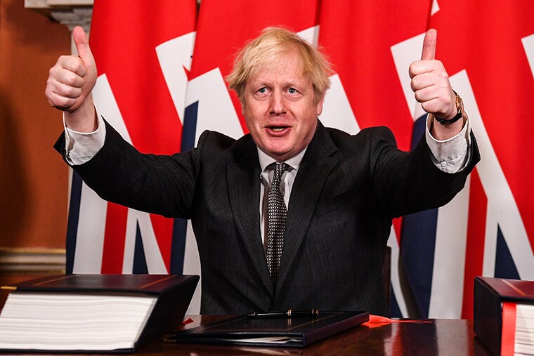 Prime Minister, Boris Johnson gives a thumbs up gesture after signing the Brexit trade deal with the EU in number 10 Downing Street on December 30, 2020 in London, United Kingdom. The United Kingdom and the European Union agreed a Trade and Cooperation Agreement, an Agreement on Nuclear Cooperation and an Agreement on Security Procedures for Exchanging and Protecting Classified Information on Christmas Eve 2020. These Agreements change the basis of the UK"s relationship with the EU from EU law to free trade and friendly cooperation. In a referendum of 23 June 2016 the British people voted to take back control of their laws, borders, money, trade and fisheries, commonly referred to as Brexit.