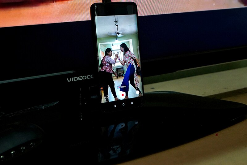 Geetha Sridha, 54, who used to post over a dozen videos on video-sharing app TikTok, and her daughter Sarada Sridhar are seen in a mobile phone"s screen as they make a video that they said will upload on an Indian app, after India banned dozens of Chinese apps including TikTok following a border clash between the two nations, inside their house in Mumbai, India, July 1, 2020.