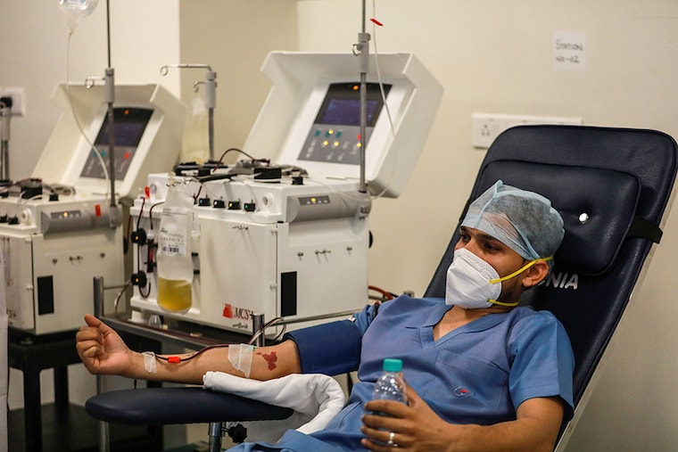 A plasma donor is seen at the newly inaugurated plasma bank at the state-run Institute of Liver and Biliary Sciences (ILBS) hospital for treatment of patients suffering from the coronavirus disease (COVID-19), amidst the spread of the disease in New Delhi, India, July 2, 2020.